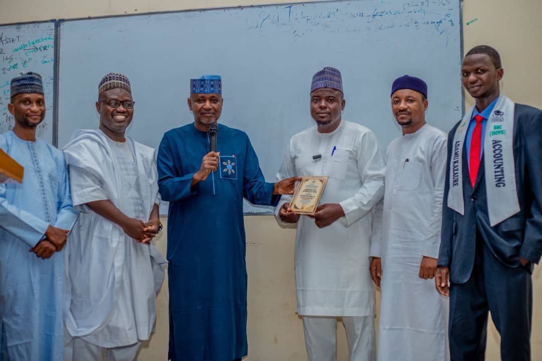 Presenting an award at a Faculty event