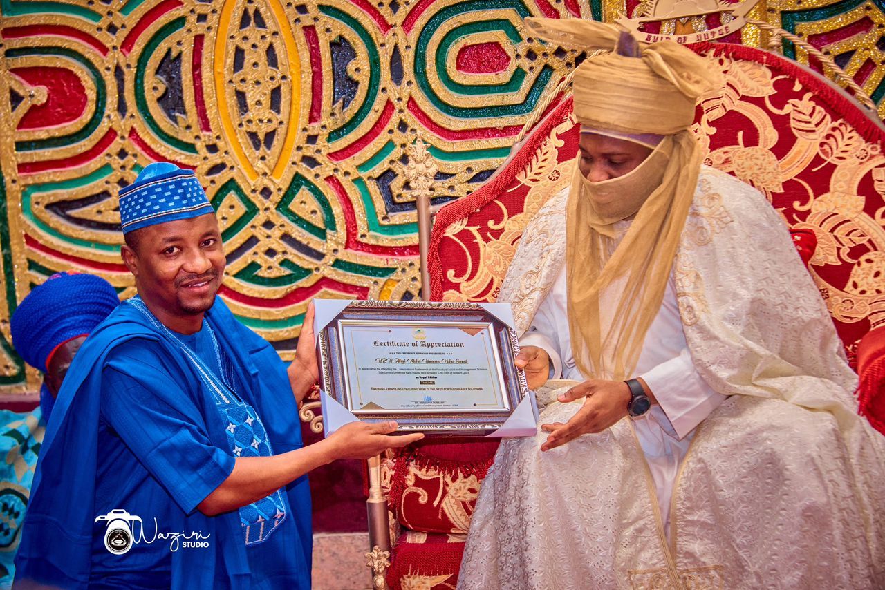 Presenting an award to a member of the Faculty community